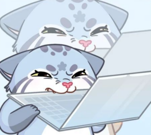 Cartoon of two frustrated gray-blue cats with laptops, one biting the keyboard while the other watches from behind, both looking stressed or confused.